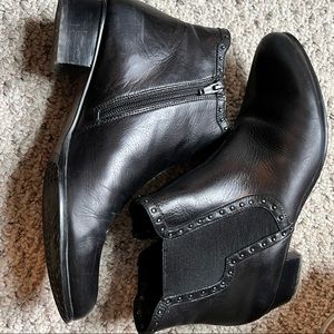 Black leather booties w nailhead trim.